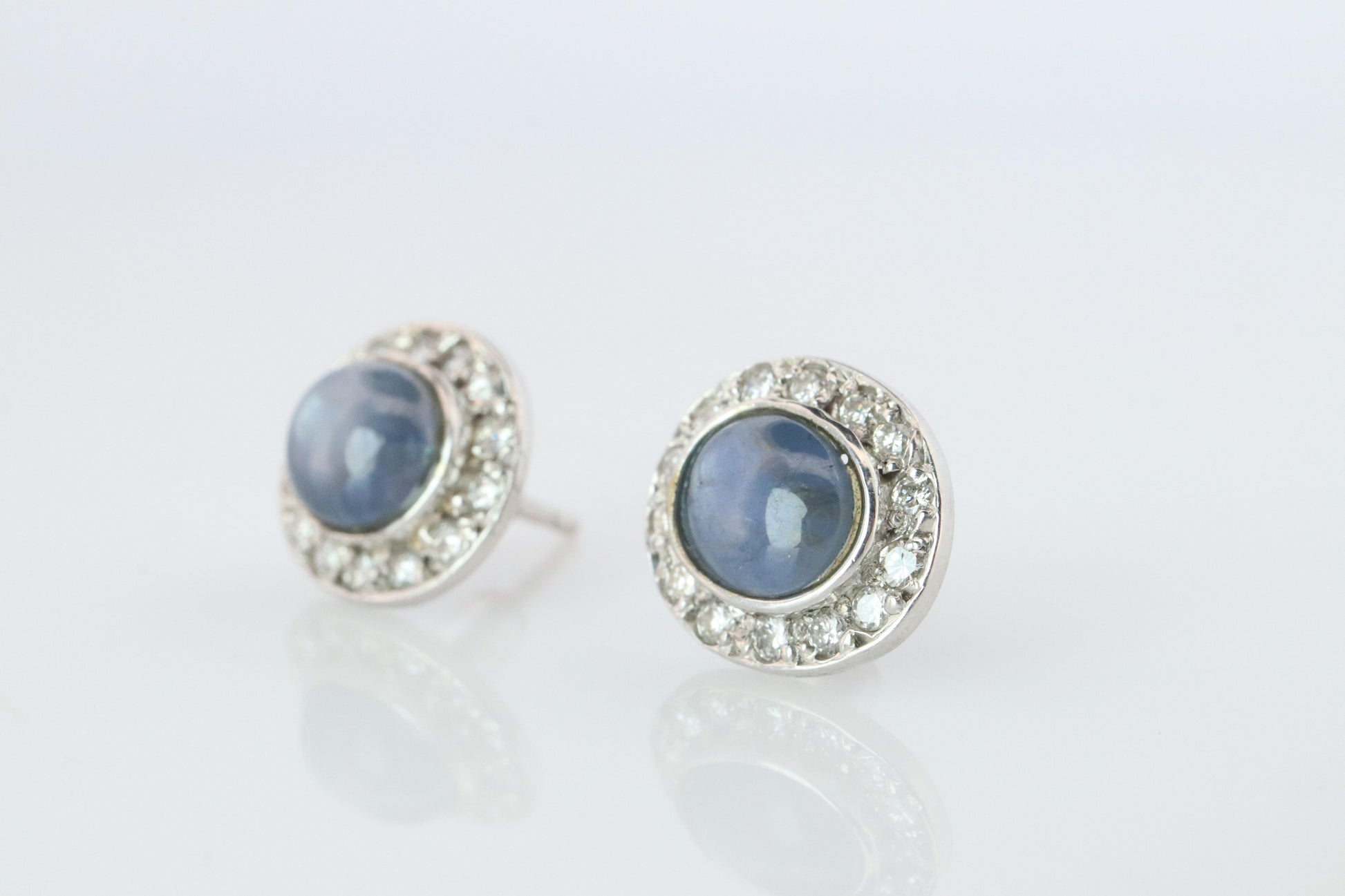 Star Sapphire Stud Earrings. Platinum PT900 Star Saphire Halo Diamond earrings.