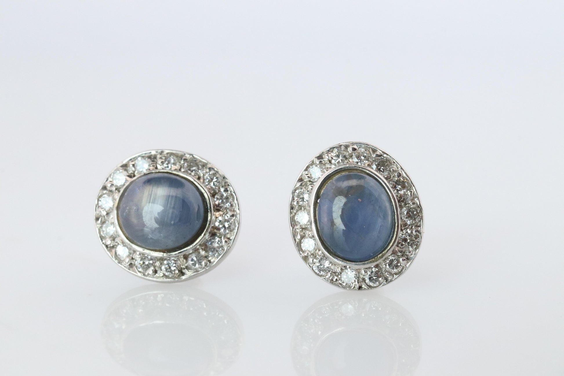 Star Sapphire Stud Earrings. Platinum PT900 Star Saphire Halo Diamond earrings.