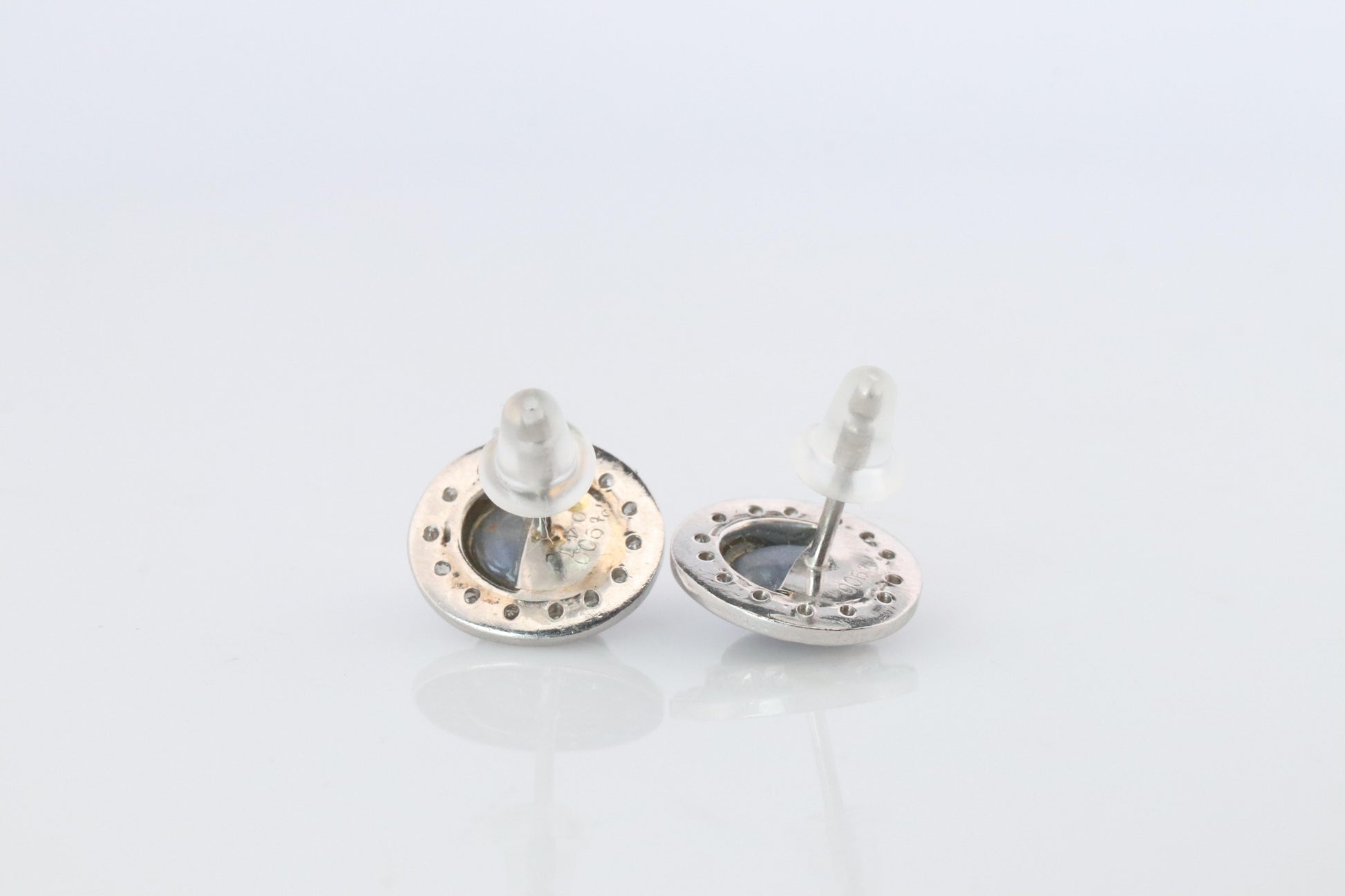 Star Sapphire Stud Earrings. Platinum PT900 Star Saphire Halo Diamond earrings.