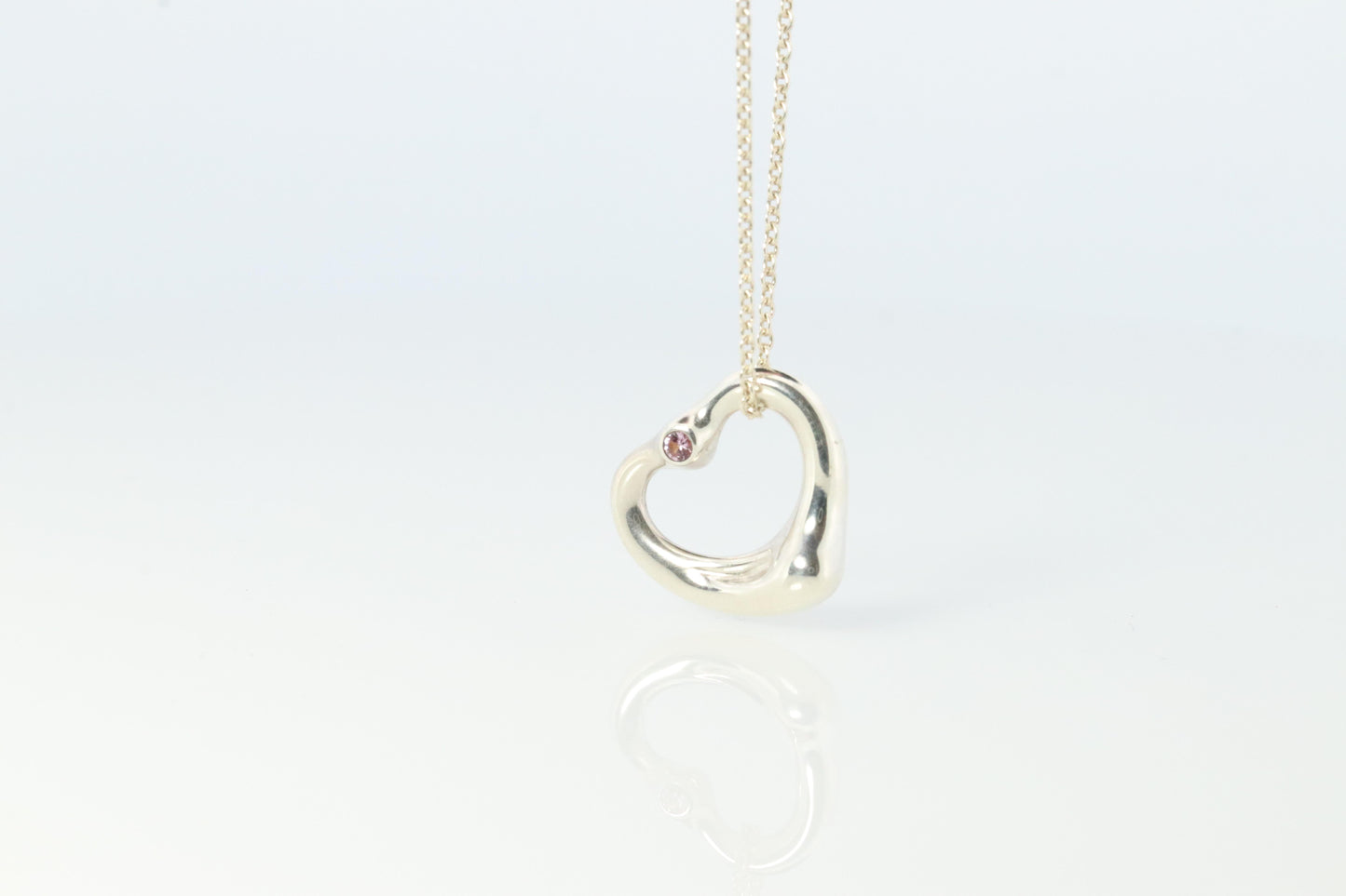 Tiffany and Co Heart Pendant. Sterling Silver 925 T&Co Pink sapphire Heart.