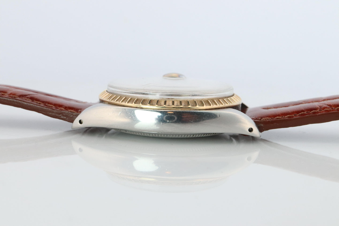Genuine Rolex 1505 Watch. Rolex Oyster Perpetual Date 34mm Engine Turned Bezel