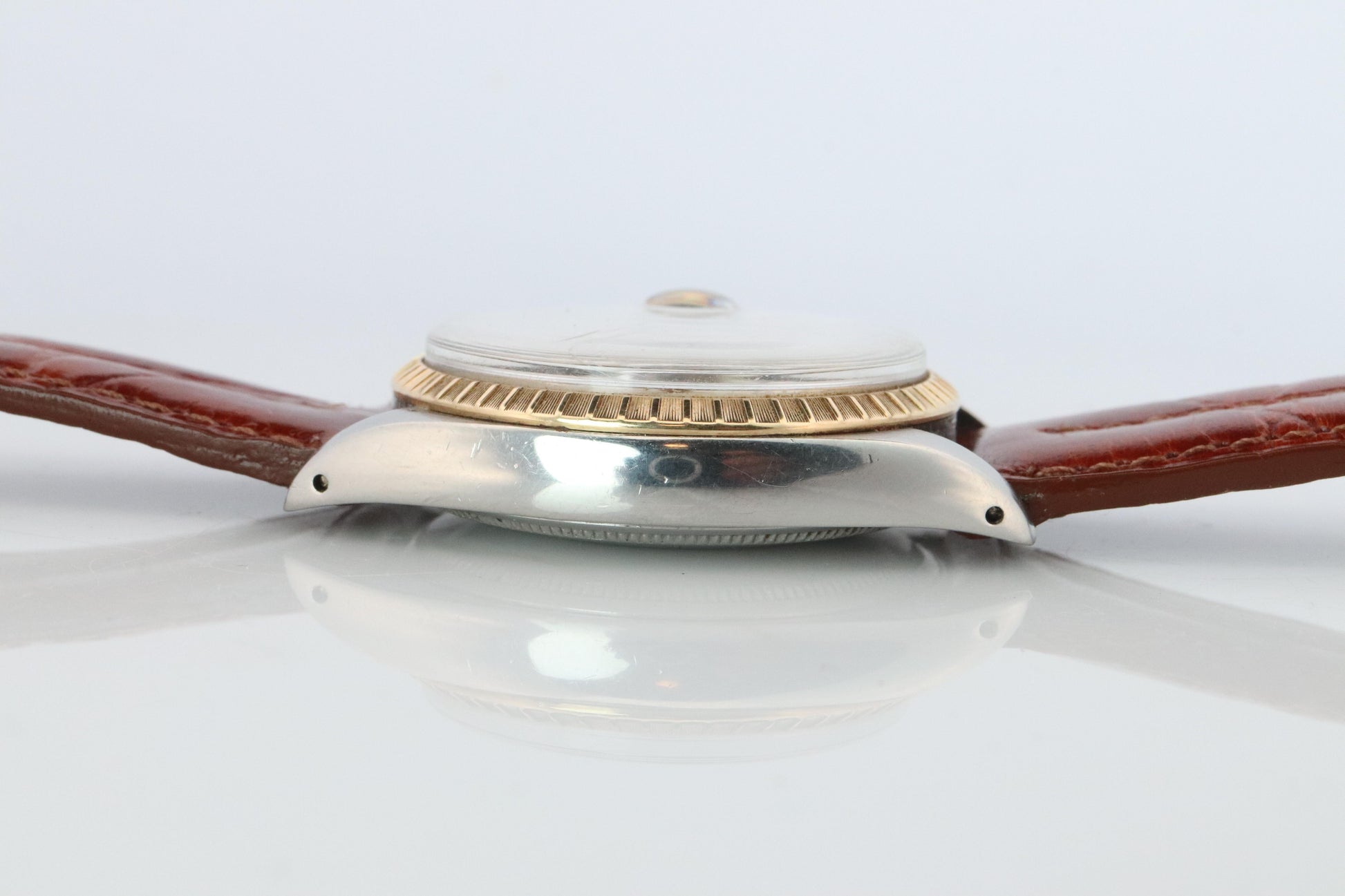 Genuine Rolex 1505 Watch. Rolex Oyster Perpetual Date 34mm Engine Turned Bezel