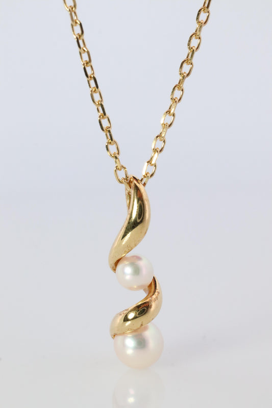 Mikimoto Pendant. 18k Gold Mikimoto Swirl Pearl Necklace.