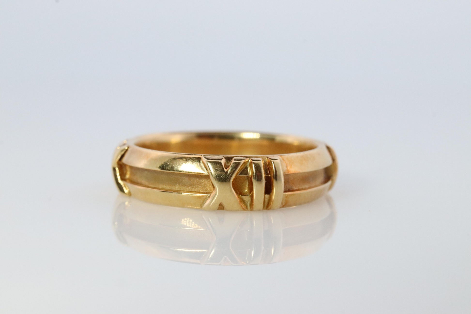 Tiffany and Co. Atlas Ring. Authentic 18k Yellow Gold Tiffany Roman Number Band.