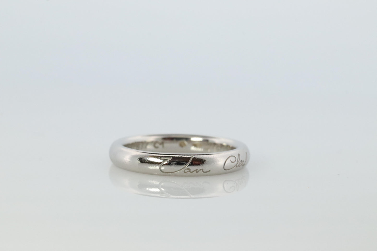 Preowned Van Cleef Arpels band. Genuine VCA PT950 Platinum Signature ring.