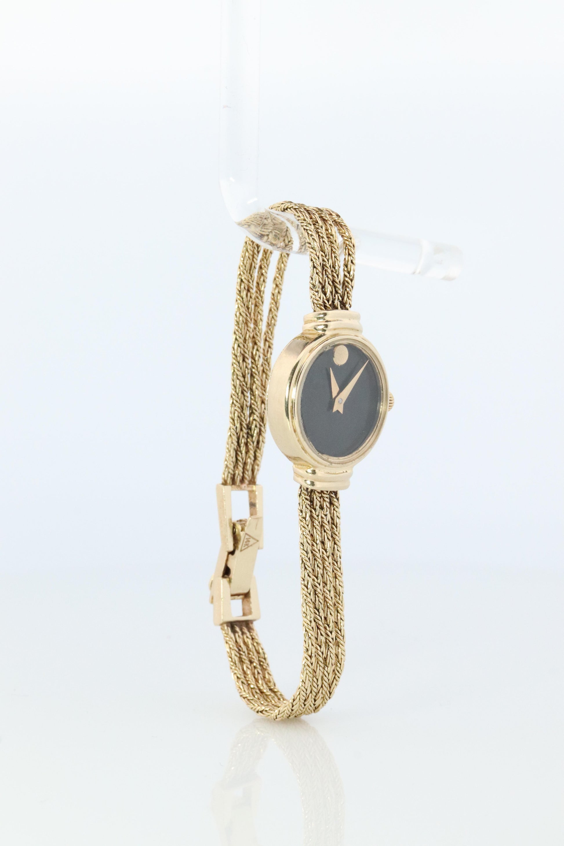 14k MOVADO Watch. 14k Yellow Gold Ladies Movado Rope Bracelet D43 Wristwatch