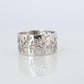 Mikimoto Wide Band. Platinum Mikimoto Intricate Floral Negative Stamped ring.