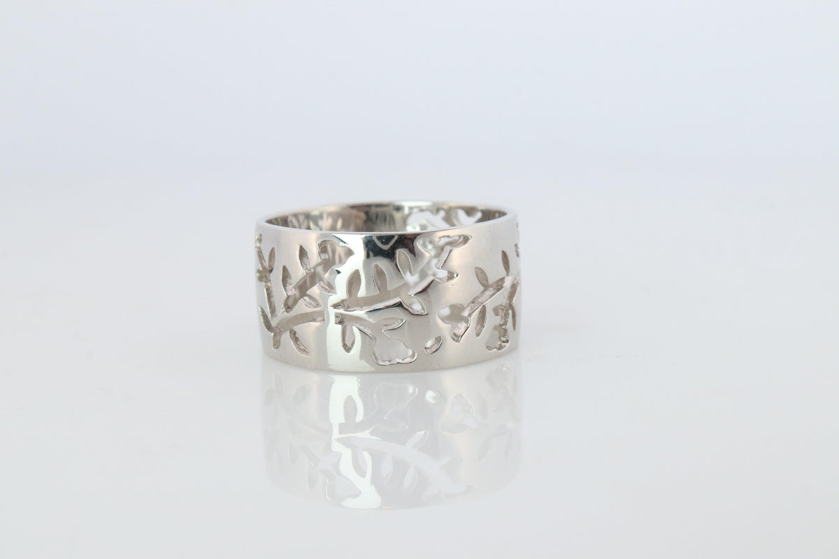 Mikimoto Wide Band. Platinum Mikimoto Intricate Floral Negative Stamped ring.