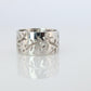 Mikimoto Wide Band. Platinum Mikimoto Intricate Floral Negative Stamped ring.