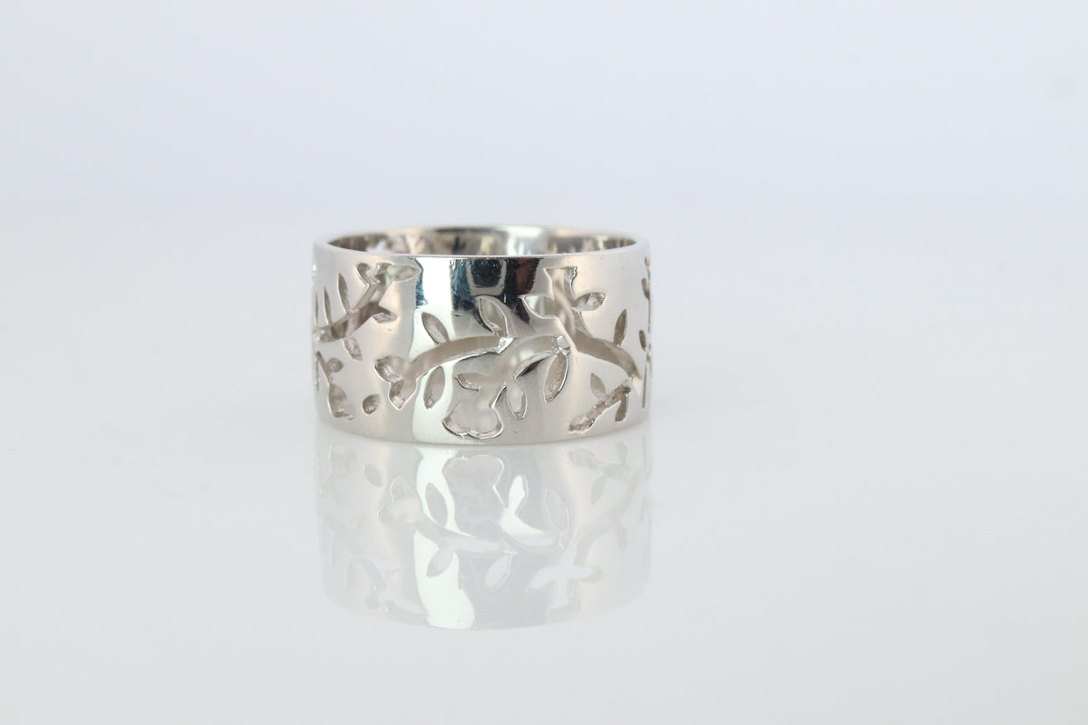 Mikimoto Wide Band. Platinum Mikimoto Intricate Floral Negative Stamped ring.