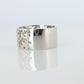 Mikimoto Wide Band. Platinum Mikimoto Intricate Floral Negative Stamped ring.