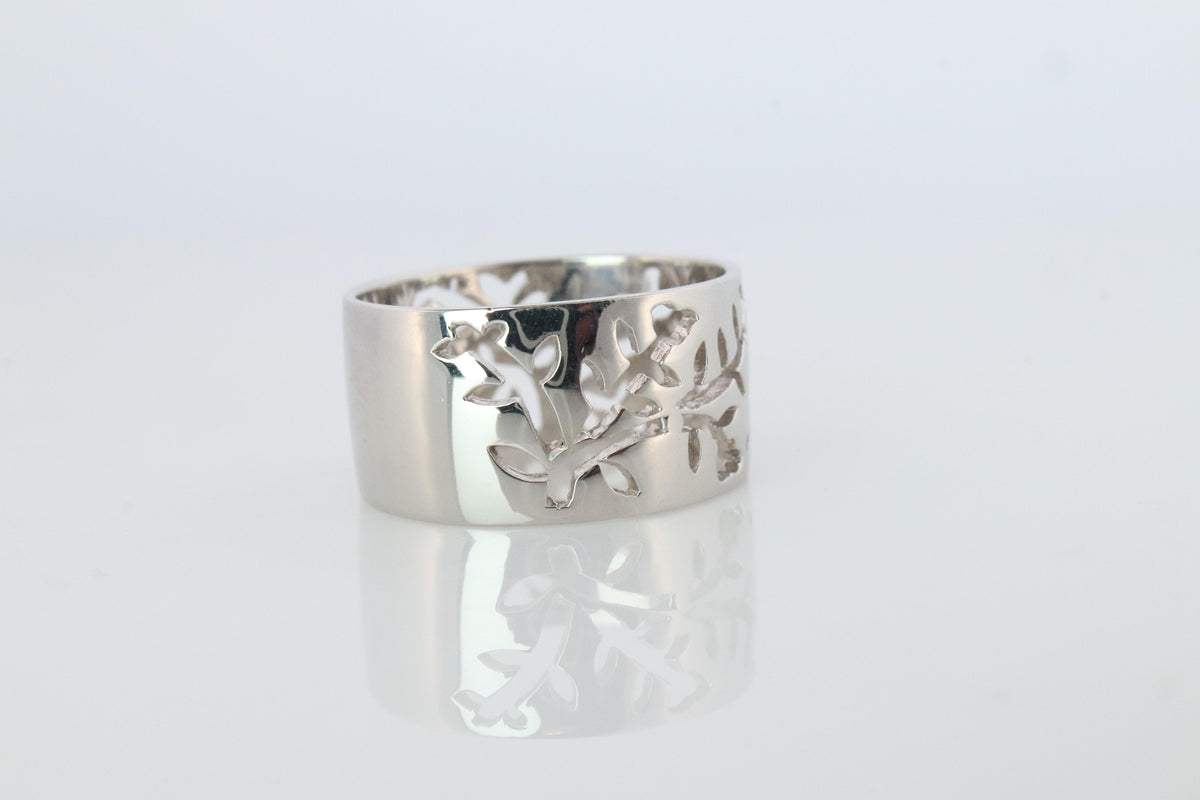 Mikimoto Wide Band. Platinum Mikimoto Intricate Floral Negative Stamped ring.