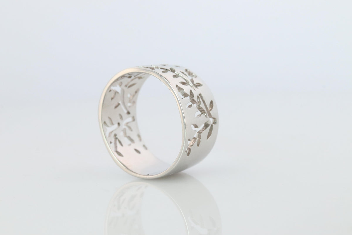 Mikimoto Wide Band. Platinum Mikimoto Intricate Floral Negative Stamped ring.