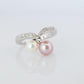 Mikimoto Ring. 18k Gold Mikimoto Pearl and Diamond Cluster. Twin pearl love knot