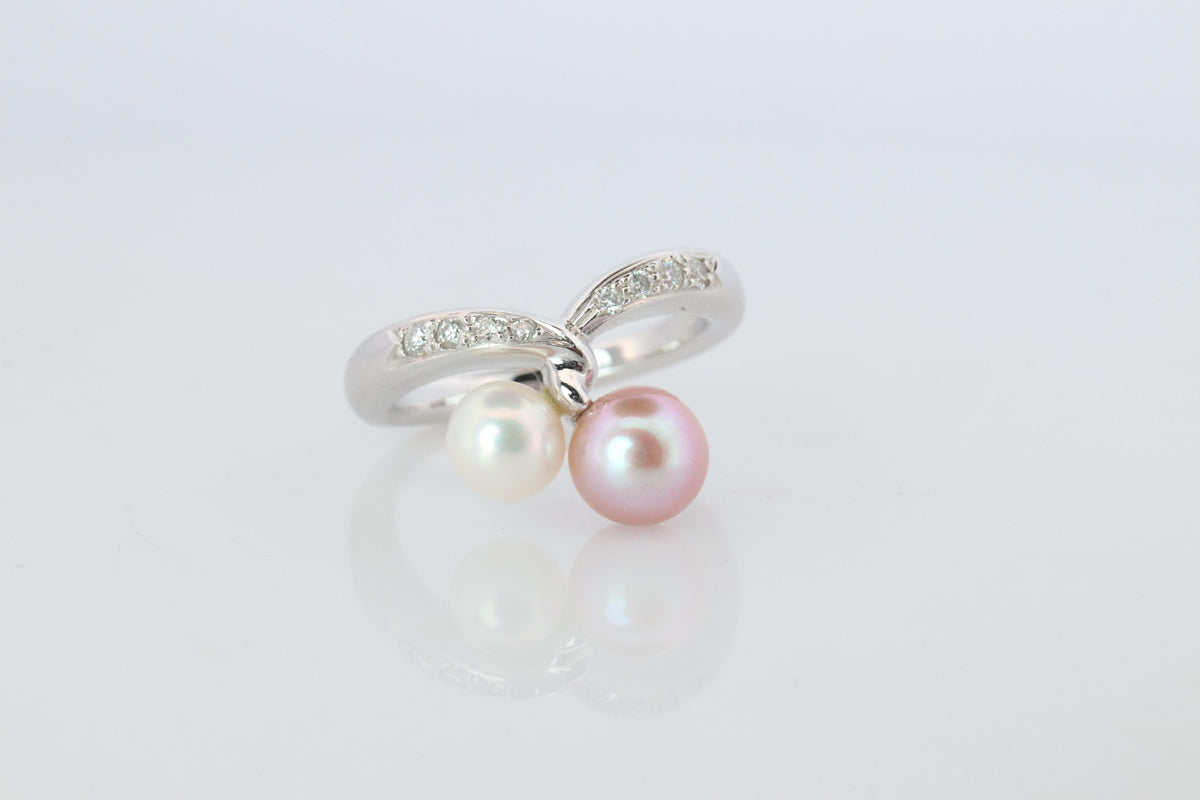 Mikimoto Ring. 18k Gold Mikimoto Pearl and Diamond Cluster. Twin pearl love knot