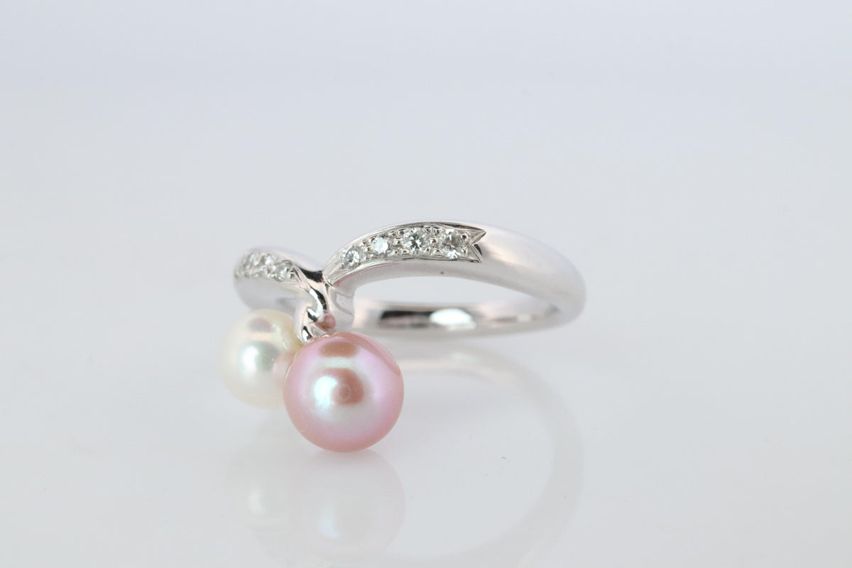 Mikimoto Ring. 18k Gold Mikimoto Pearl and Diamond Cluster. Twin pearl love knot