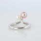 Mikimoto Ring. 18k Gold Mikimoto Pearl and Diamond Cluster. Twin pearl love knot