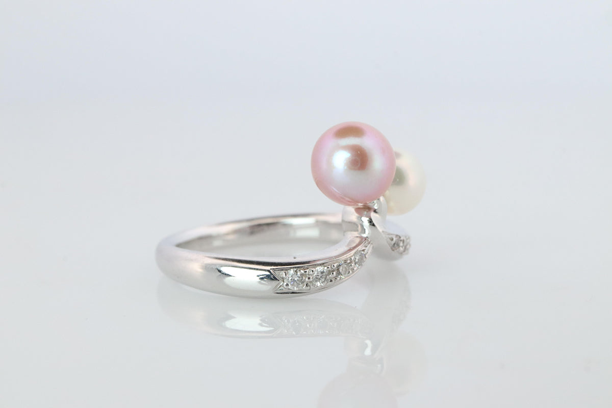 Mikimoto Ring. 18k Gold Mikimoto Pearl and Diamond Cluster. Twin pearl love knot