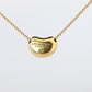 Tiffany & Co. 18k Gold Chain and Bean Pendant Necklace. 750 Yellow Gold Tiffany