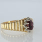 10k Ruby and Diamond HALO ring. 10k Yellow Gold Ribbed shank Ruby Halo ring.