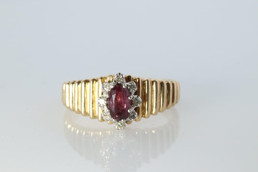 10k Ruby and Diamond HALO ring. 10k Yellow Gold Ribbed shank Ruby Halo ring.