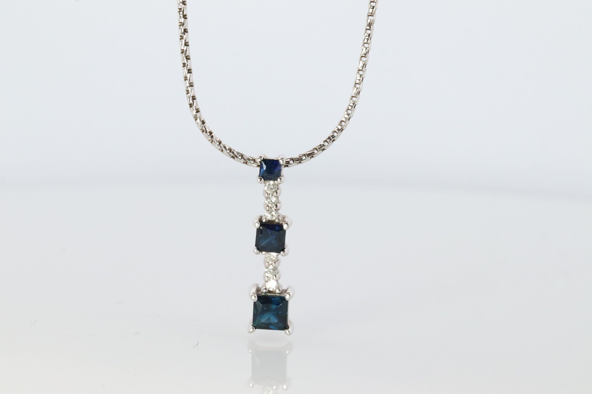 Blue Sapphire diamond Journey pendant. 14k Gold Princess Sapphires Necklace