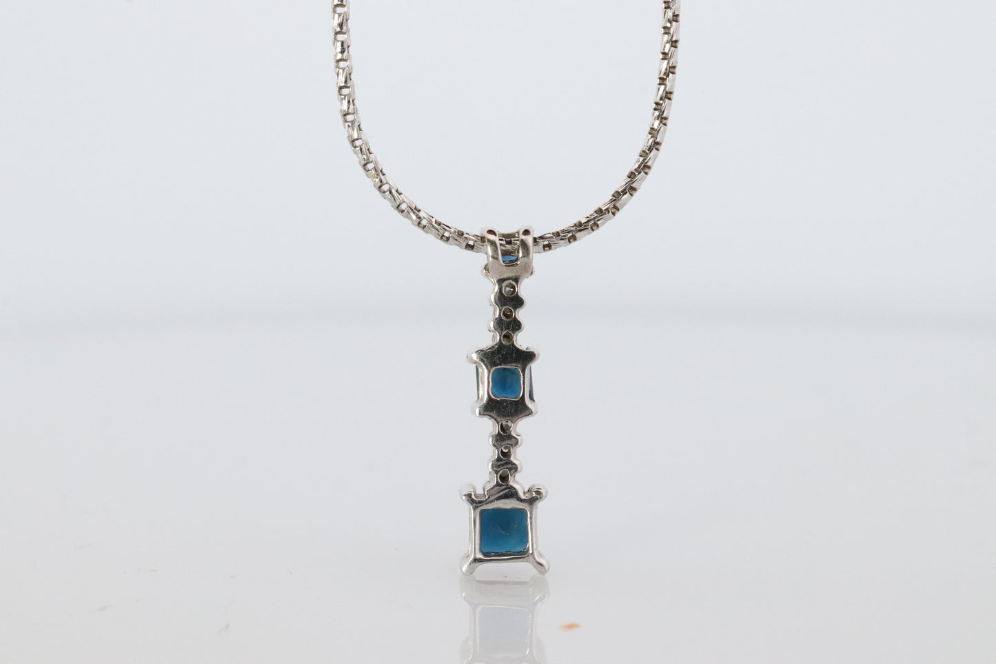 Blue Sapphire diamond Journey pendant. 14k Gold Princess Sapphires Necklace