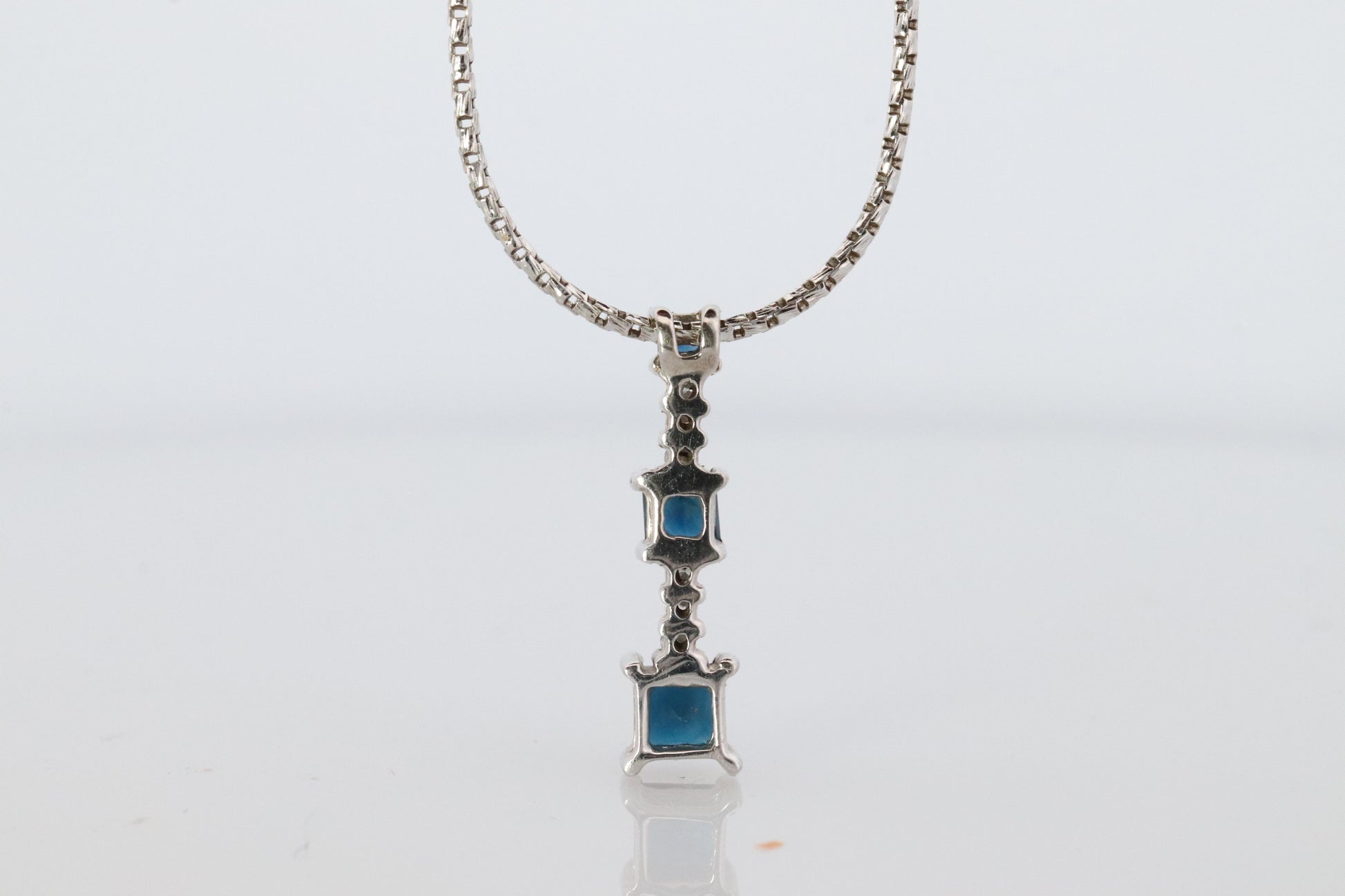 Blue Sapphire diamond Journey pendant. 14k Gold Princess Sapphires Necklace
