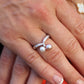 Mikimoto Ring. 18k Gold Mikimoto Pearl and Diamond Cluster. Twin pearl love knot