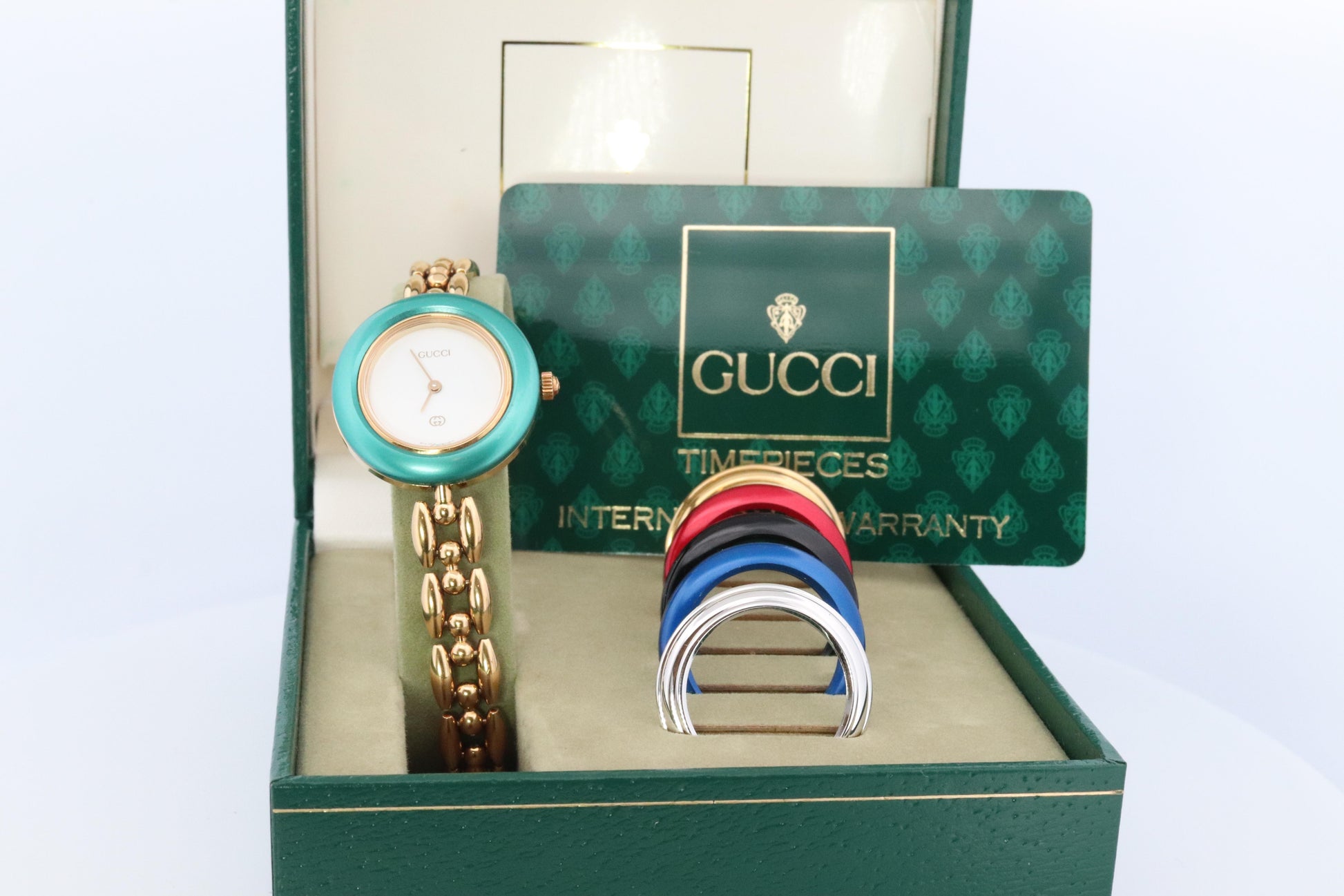 Vintage GUCCI Quartz 11/12 Watch. Gucci Multiple BEZEL Ladies Gold wristwatch