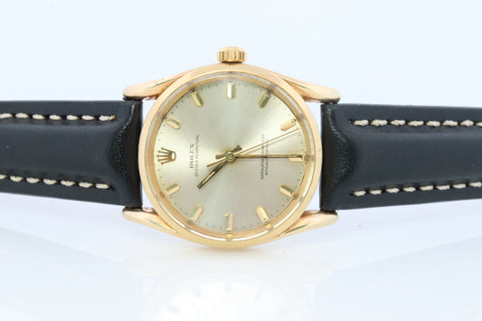 ROLEX Oyster Perpetual Ref 1011 / 1010 "Bombe / Bombay". 14K Yellow Gold Case and Bracelet. Circa 1960.