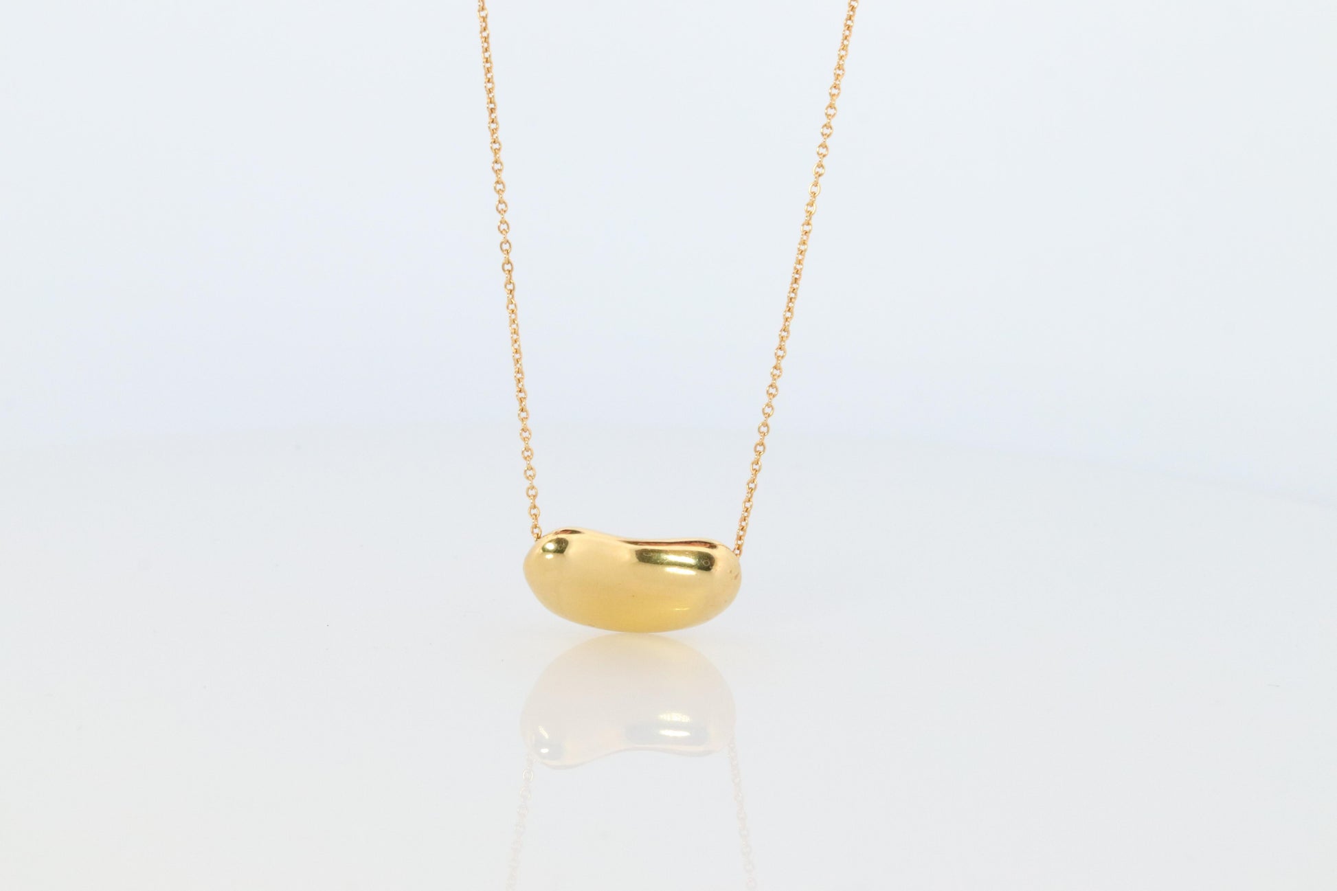 Tiffany & Co. 18k Gold Chain and Bean Pendant Necklace. 750 Yellow Gold Tiffany