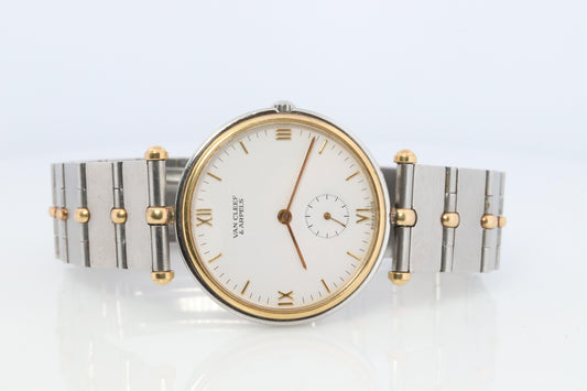 Van Cleef and Arpels 416 604 B4 watch. La Collection 18k SS Round 32mm Watch