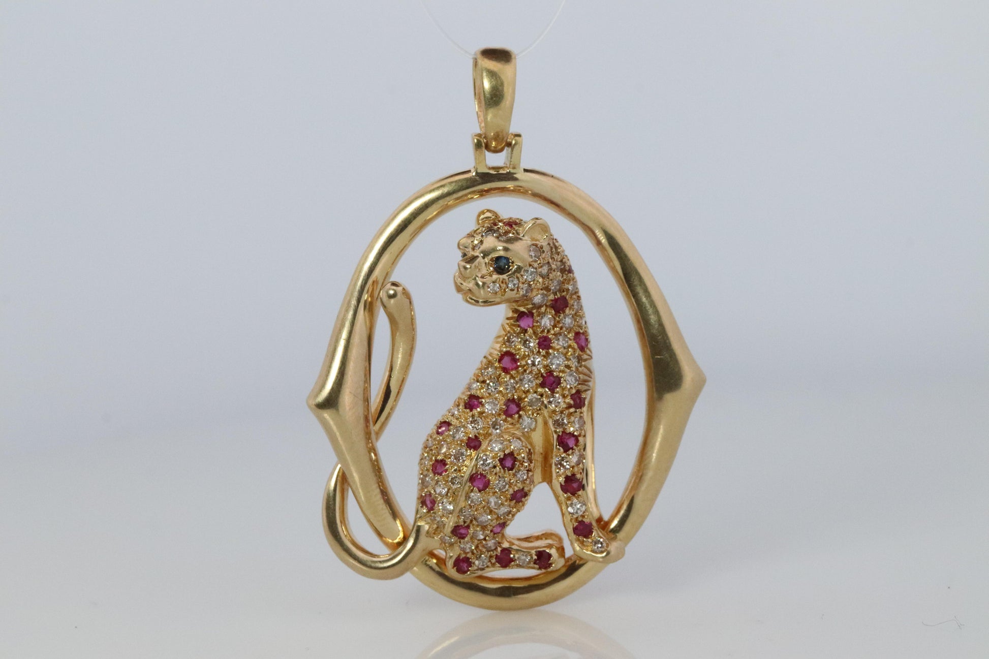 18k Panther Leopard Jaguar Cheetah Ruby Pendant. Encrusted Rubies and Diamonds.