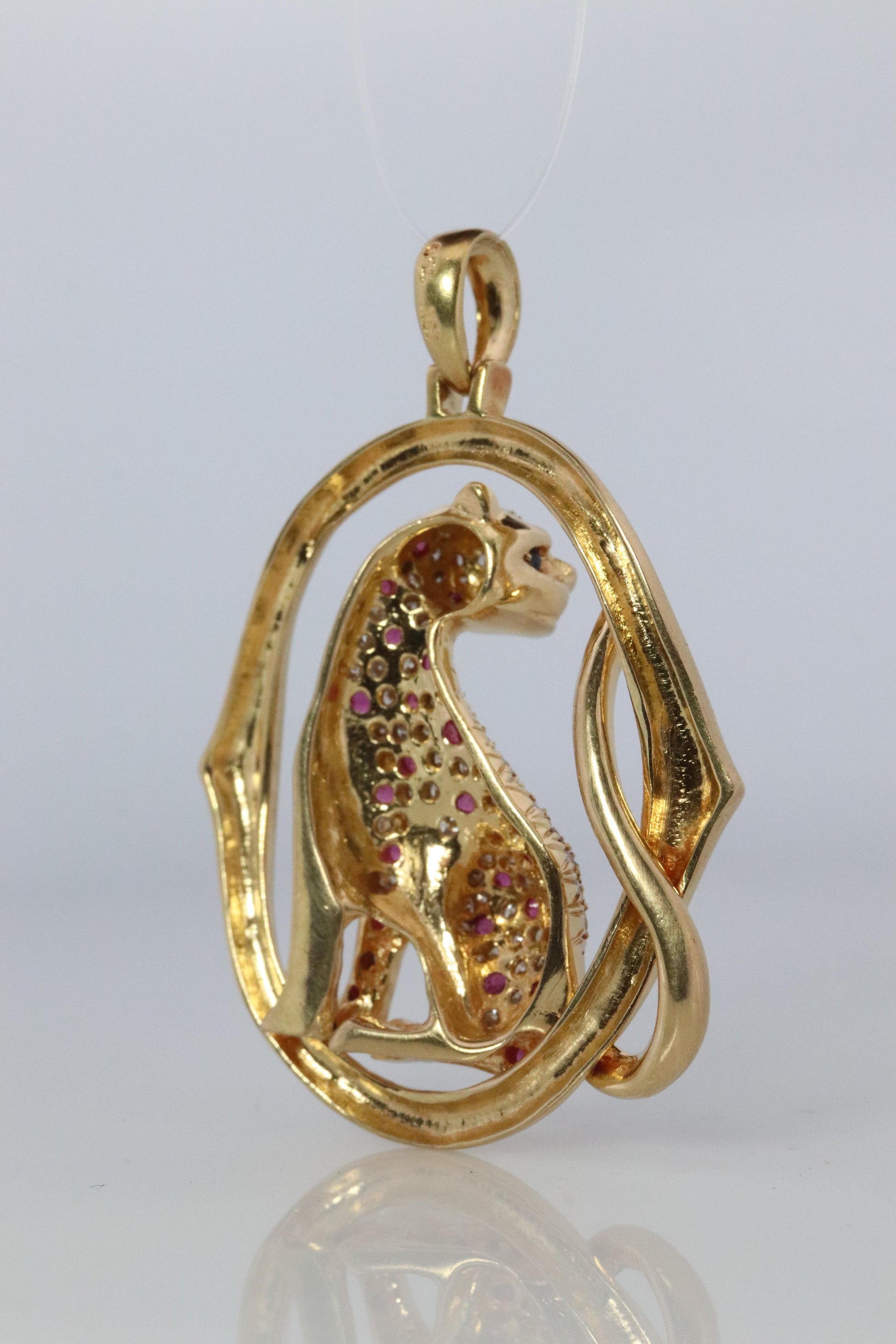 18k Panther Leopard Jaguar Cheetah Ruby Pendant. Encrusted Rubies and Diamonds.