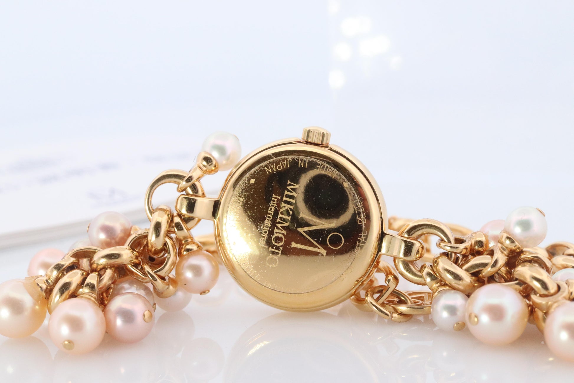Mikimoto Watch. Mikimoto Pearl Dangle Bracelet Ladies Watch. MOP Dial