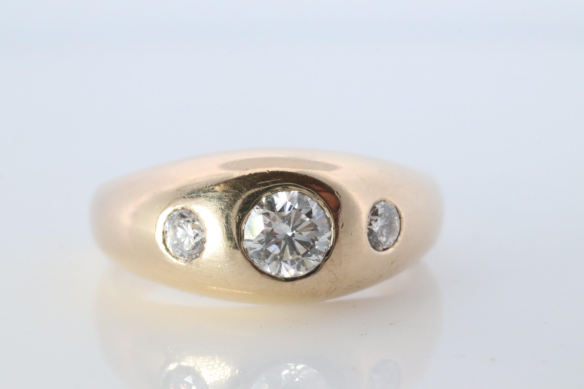 Antique 14k Triple Diamond 1ctw ring. Gypsy Diamond bezel set into Signet band.