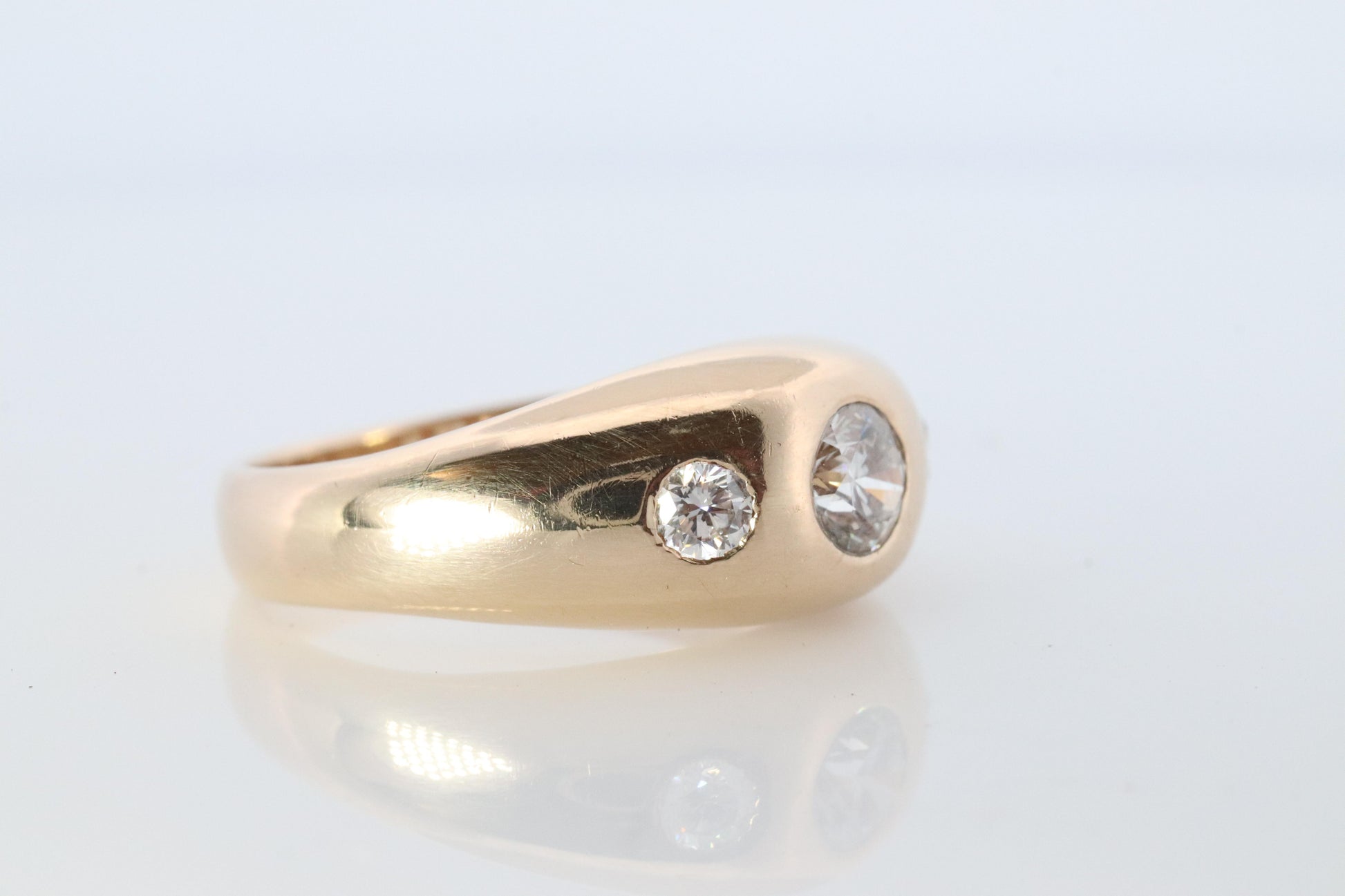 Antique 14k Triple Diamond 1ctw ring. Gypsy Diamond bezel set into Signet band.