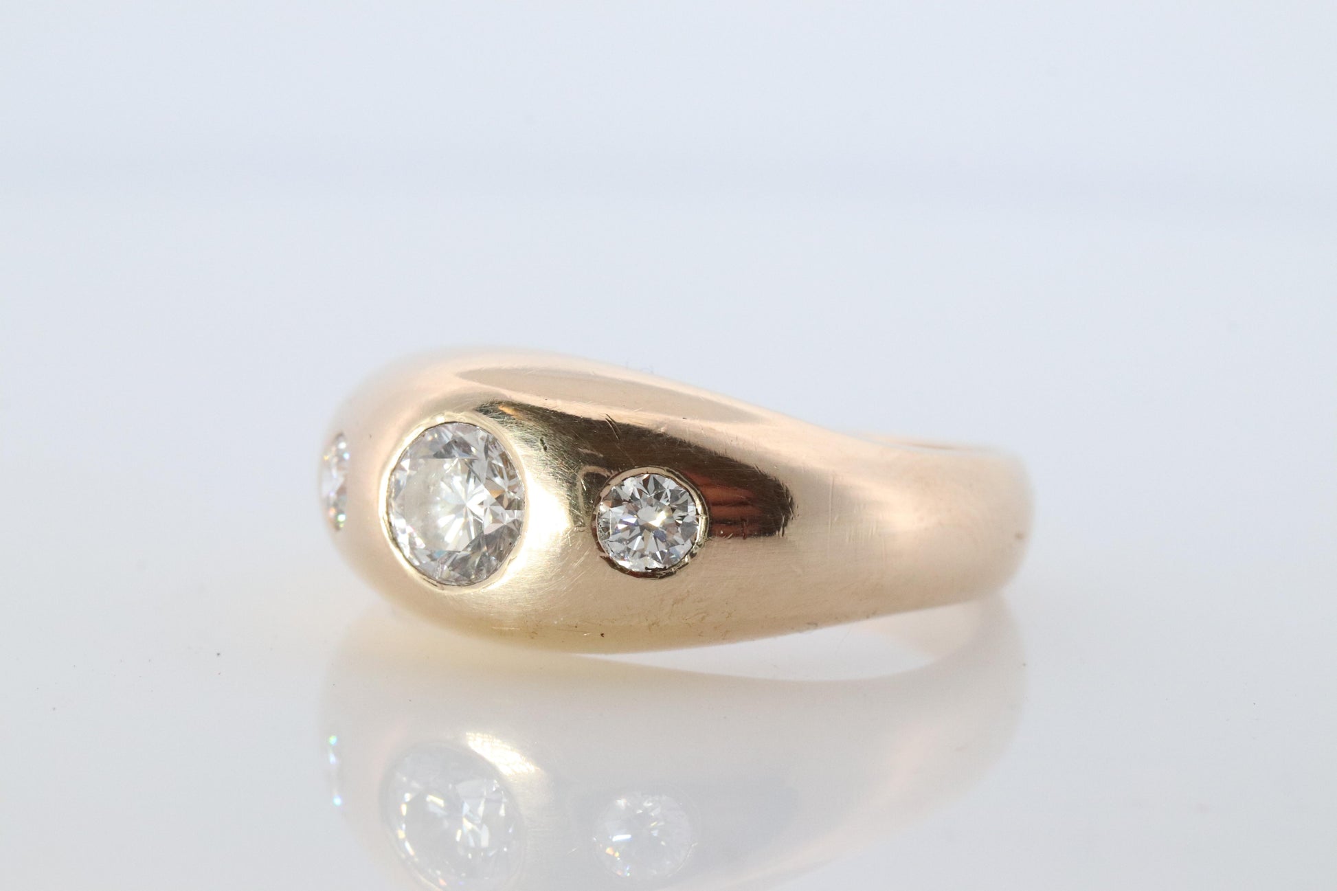 Antique 14k Triple Diamond 1ctw ring. Gypsy Diamond bezel set into Signet band.