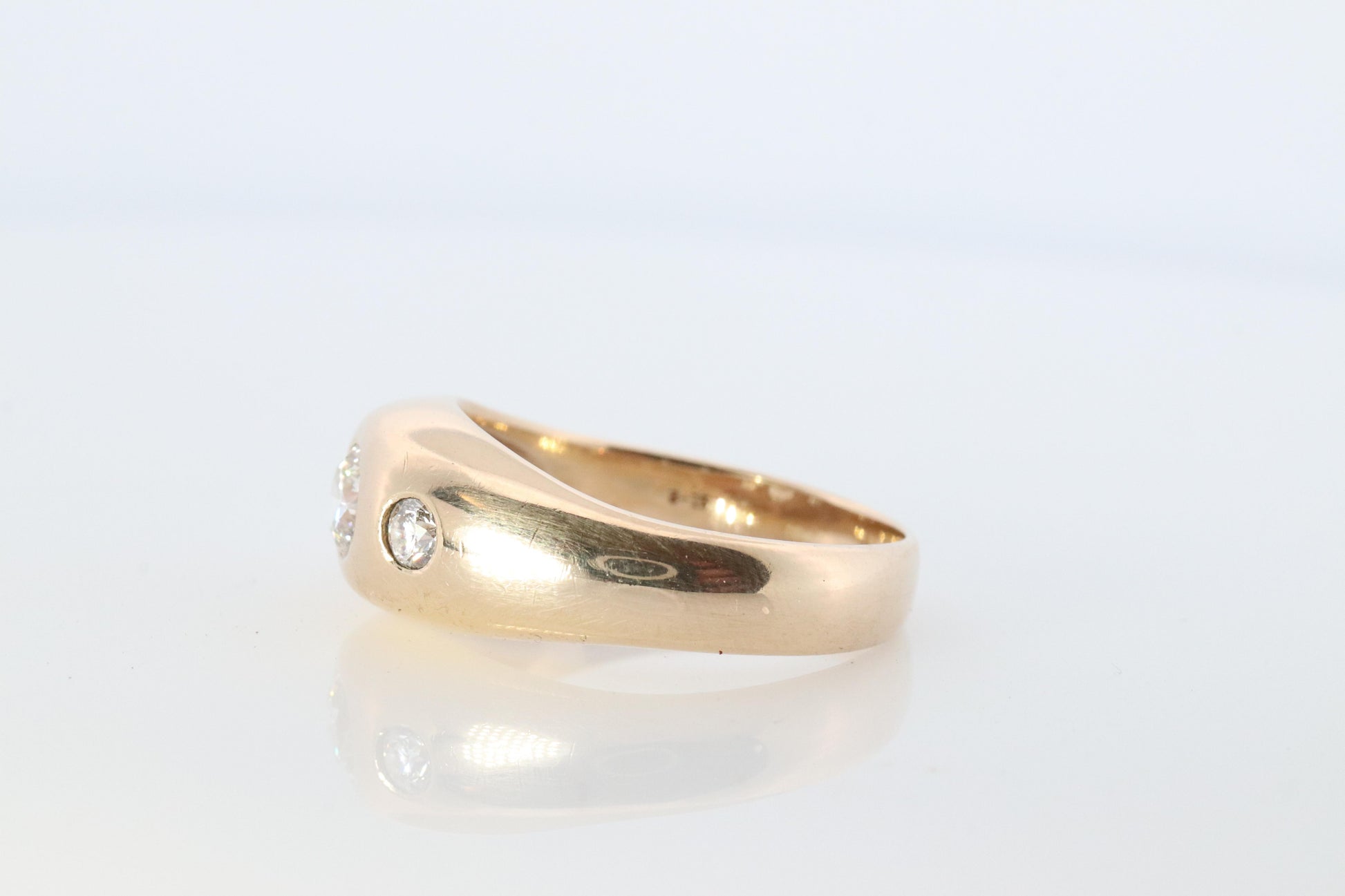 Antique 14k Triple Diamond 1ctw ring. Gypsy Diamond bezel set into Signet band.