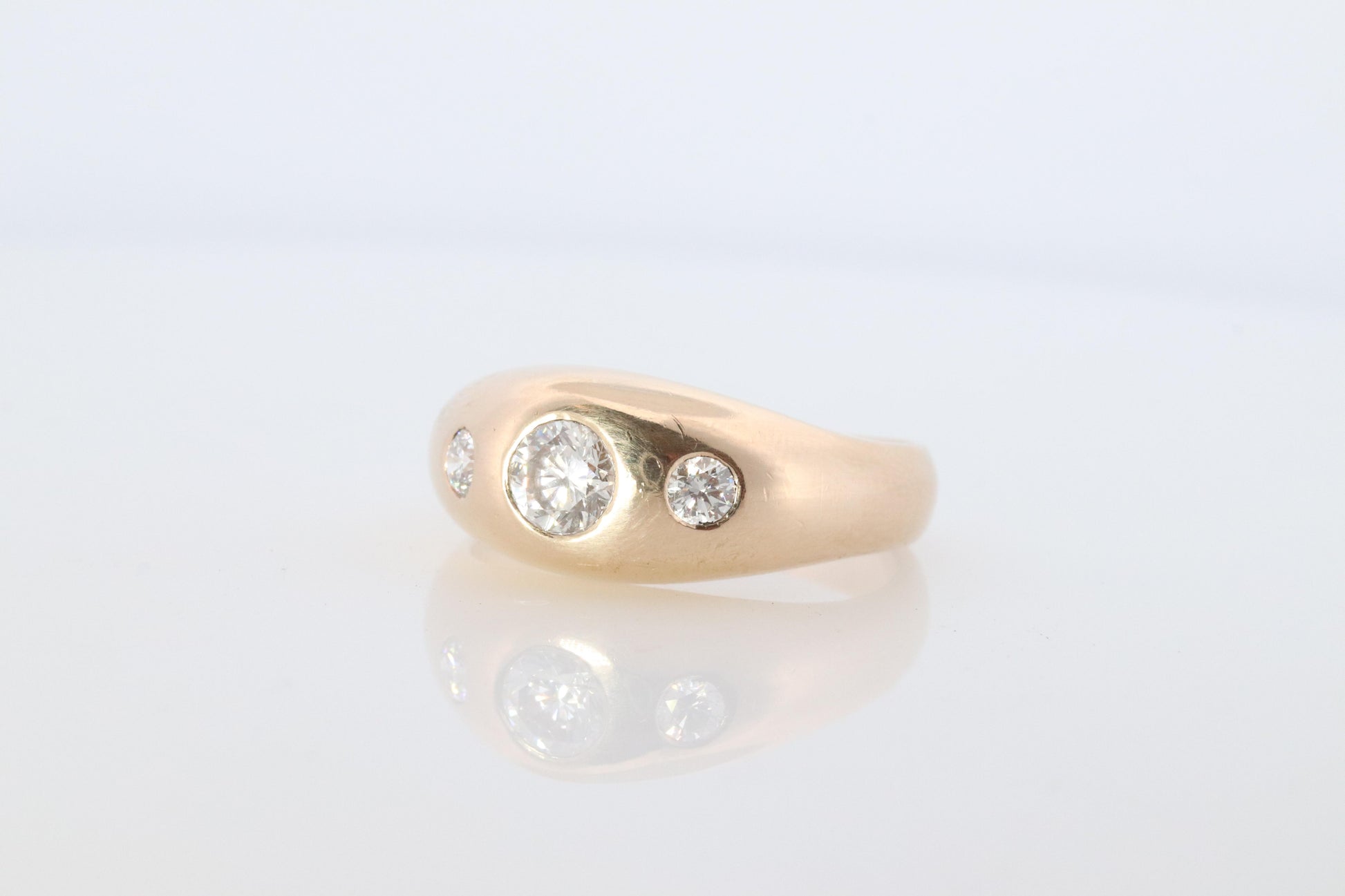 Antique 14k Triple Diamond 1ctw ring. Gypsy Diamond bezel set into Signet band.