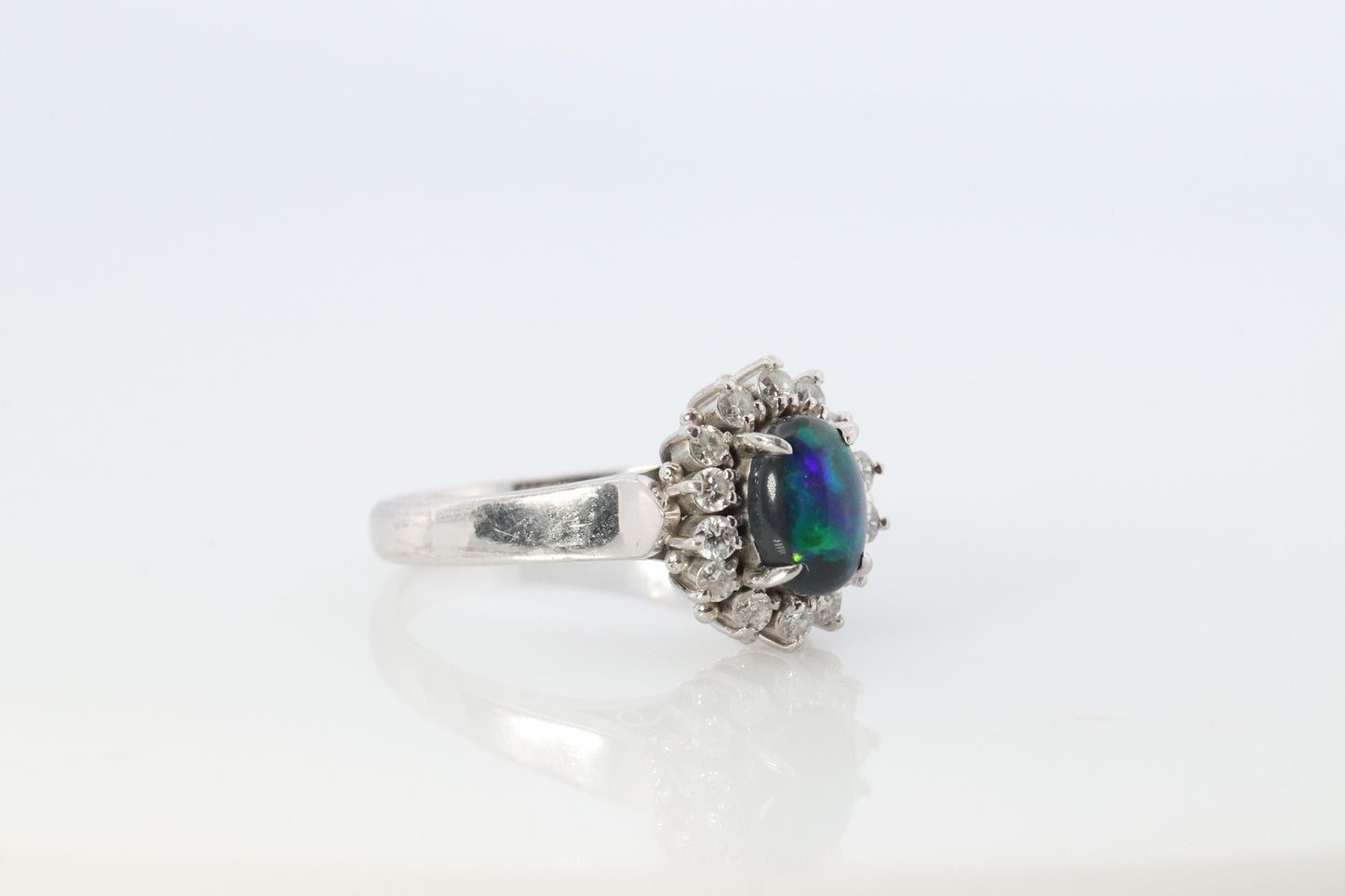 Black Opal Diamond Ring. PT900 Platinum Opal Diamond Halo Ballerina Ring Band.
