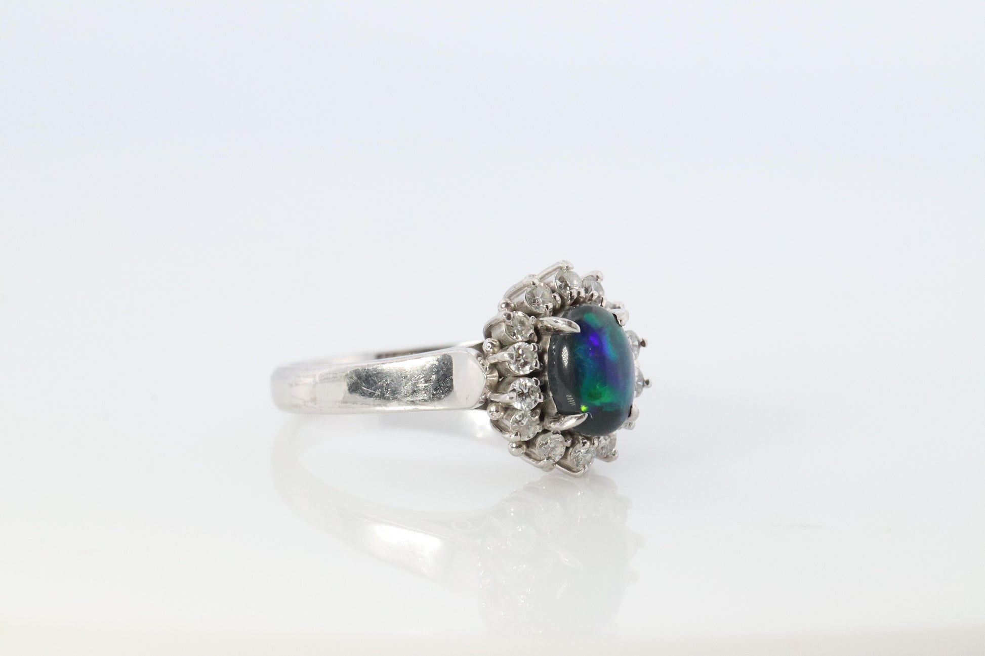 Black Opal Diamond Ring. PT900 Platinum Opal Diamond Halo Ballerina Ring Band.