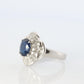 Sapphire and diamond Ballerina ring. Platinum Blue natural sapphire HALO ring