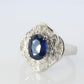 Sapphire and diamond Ballerina ring. Platinum Blue natural sapphire HALO ring