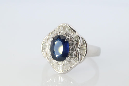 Sapphire and diamond Ballerina ring. Platinum Blue natural sapphire HALO ring