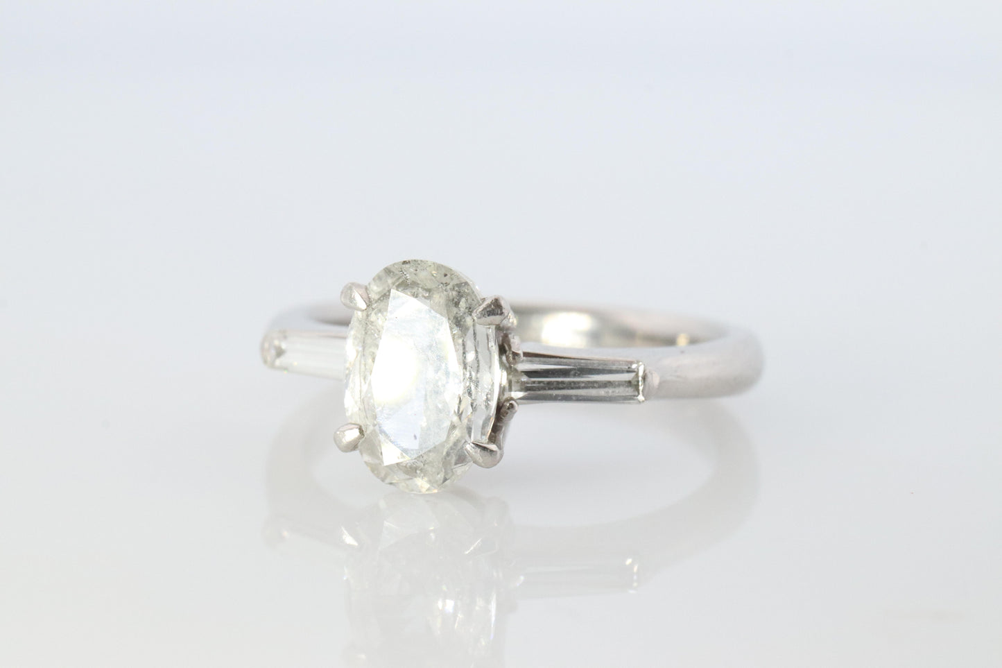 LARGE Diamond Oval engagement ring. Platinum 1CT Oval Diamond Solitaire baguette