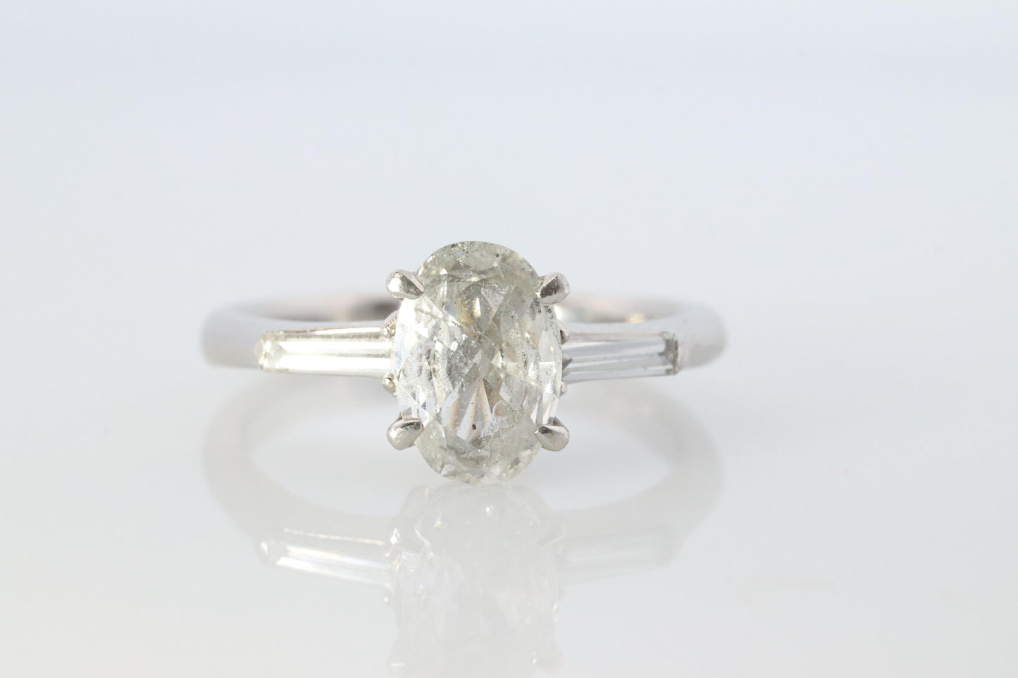 LARGE Diamond Oval engagement ring. Platinum 1CT Oval Diamond Solitaire baguette
