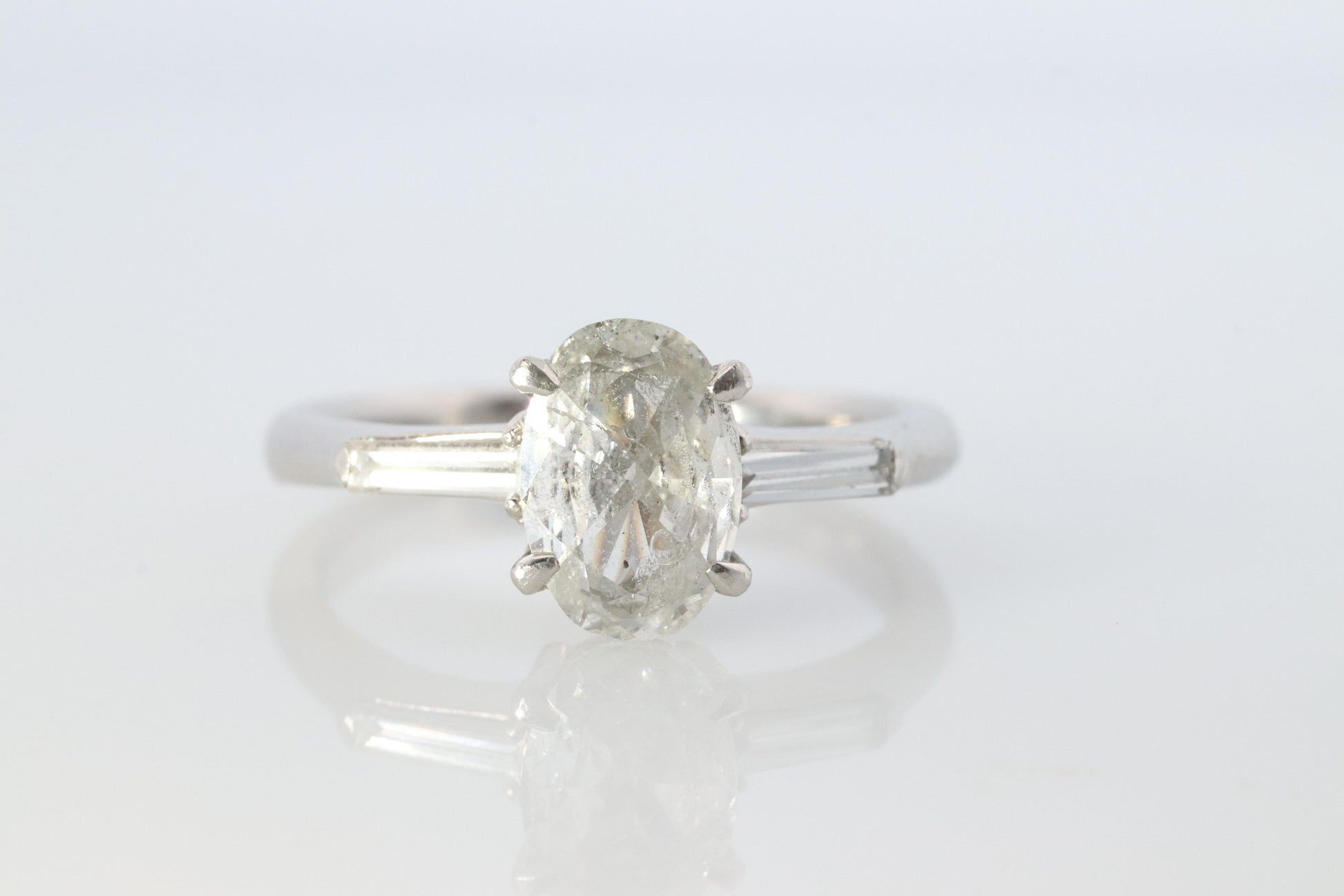 LARGE Diamond Oval engagement ring. Platinum 1CT Oval Diamond Solitaire baguette