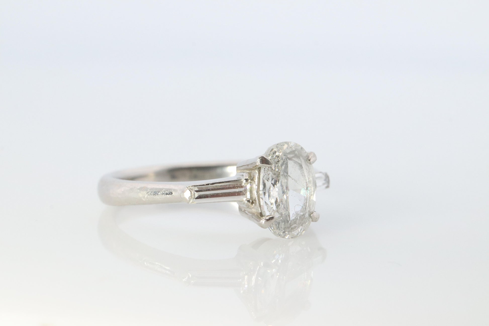 LARGE Diamond Oval engagement ring. Platinum 1CT Oval Diamond Solitaire baguette